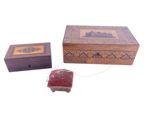 A 19th century Tunbridge ware box with a castle to the lid, another smaller box with floral lid and a Tunbridge ware pin cush