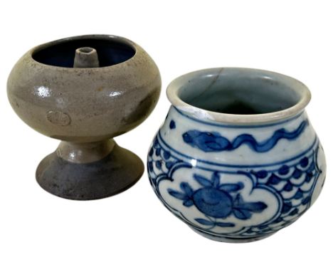 Two Chinese ceramic items to include: a Ming Dynasty blue and white jar with a Song dynasty oil lamp, height approx. 7 cm (2)