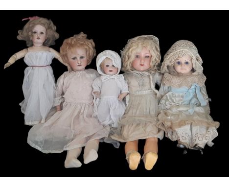 Five dolls including early 20th century bisque head dolls by Hugo Wiegand, Armand Marseille and E Heubach etc, height range 3