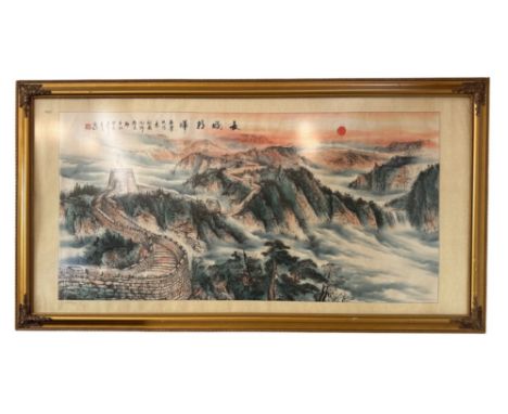 A large 20th Century Chinese print of an ink and watercolour painting of the Great Wall of China, calligraphic inscription an