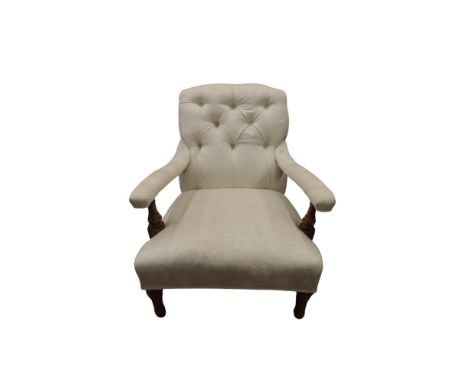 A Victorian open arm drawing room chair, re-upholstered with buttoned finish