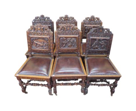 An unusual set of six mid Victorian period dining chairs in oak each carved panel back with an individual scene including org