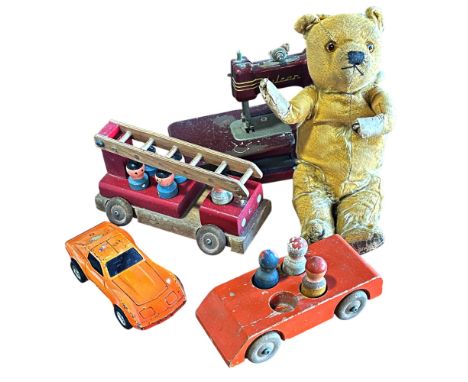 A mixed selection of old toys, including a Dinky 693 Heavy Tractor with box, an old thread bare teddy, a Tonka Toyota, a wood