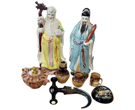 A small collection of object d'art: A Chinese carved soapstone teapot, two Chinese Republic period sage figures, 3 Doulton sa