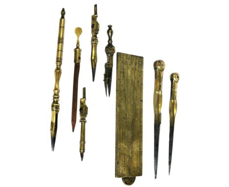 A Georgian set of drawing instruments housed within a lizard skin case, the eight instruments in brass and steel including a 