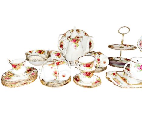An extensive collection of Royal Albert Old Country Roses tea wares comprising teacups, saucers, tea and coffee pot, bowls et