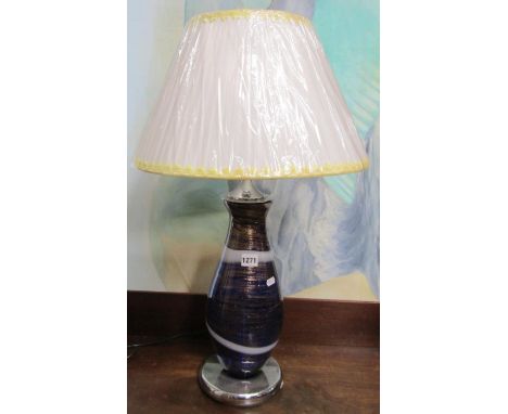 A contemporary vase shaped art glass table lamp with chrome fitting complete with shade 