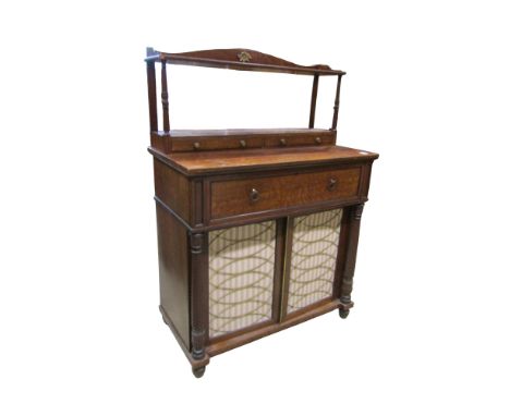 A Regency mahogany chiffonier the raised back incorporating two shallow drawers over a secretaire drawer and cupboard enclose