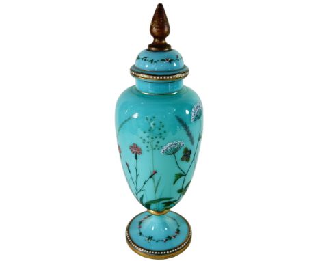 A 19th century green opaque glass urn with a lid decorated with meadow flowers, a butterfly and a dragonfly, 28cm high