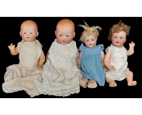 Four early 20th century German bisque head dolls  by Armand Marseille comprising a mould 991 character doll with closing blue