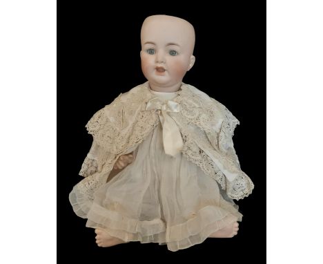 Early 20th century baby doll by Kammer &amp; Reinhardt with bisque head mould 126 by Simon &amp; Halbig; the doll has closing