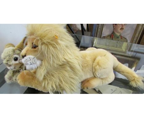 Two Steiff toys including Leo Lion no 064135 and Dormili Rabbit no 080050, both with yellow tag and pin in ear (2)