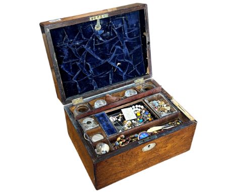 A Georgian mahogany travelling vanity box with contents of ink bottles, a quantity of collar studs, costume jewellery includi