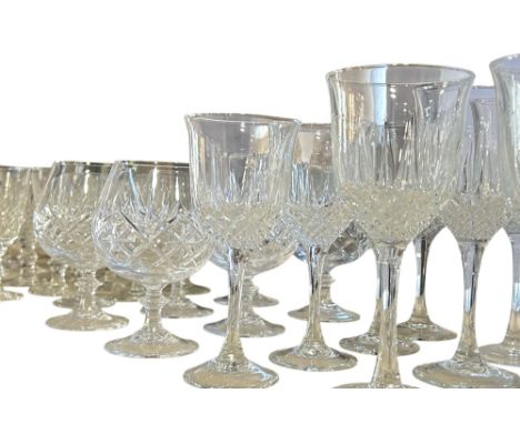 An extensive collection of Longchamps crystal glasses to include flutes, red / white wine, balloons etc