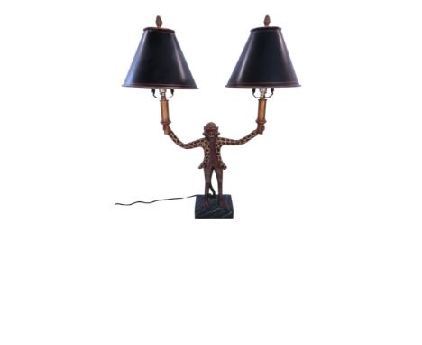 A novelty Chimpanzee wearing a leopard skin print jacket table lamp supporting two lights, and further resin novelty chimps a