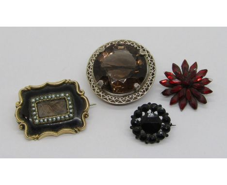 Group of four brooches comprising a 19th century yellow metal mourning brooch containing woven hair, inscribed to reverse 'A.