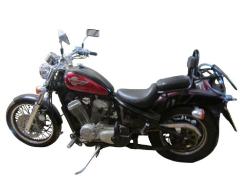 A vintage Honda ‘Shadow’ Motorbike, mileage read at 16604, registration number ‘M445DGP’