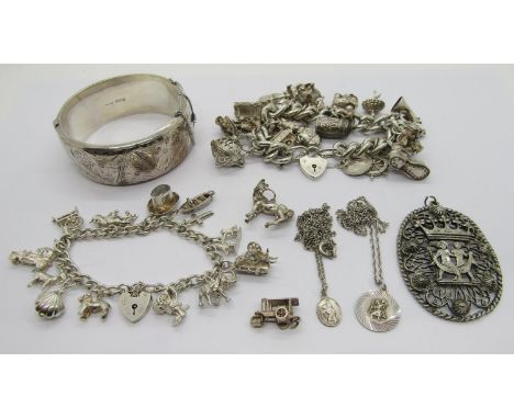 Collection of silver jewellery comprising a heavy charm bracelet with novelty charms to include a fortune teller, equestrian 
