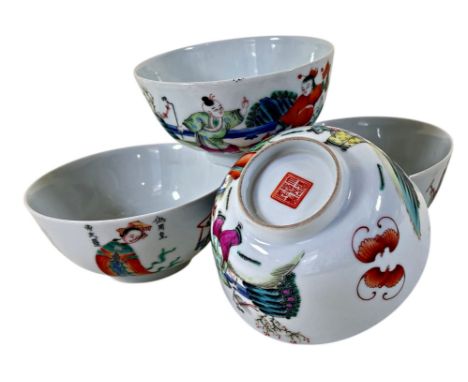 Four Chinese 20th century famille rose porcelain bowls decorated with Immortal figures, bearing iron red Daoguang seal stamps