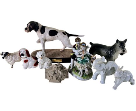 A Beswick matt glazed figure of a pointer, a Beswick ram, further animal figures etc