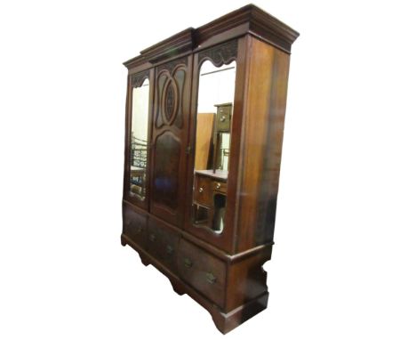 A large Victorian triple walnut wardrobe with fitted interior with three drawers below 215H x 200W x 50D 