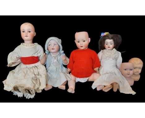 A mixed group of early 19th century bisque head dolls including a doll by Jules Verlingue marked '3 Liane' with jointed compo