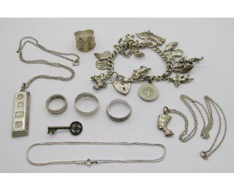 Group of vintage silver and white metal jewellery to include a charm bracelet hung with novelty charms to include the Pied Pi