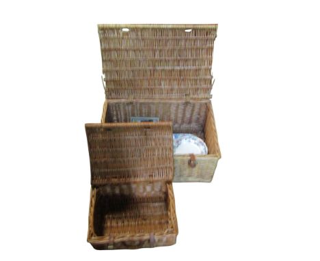 A large old bound pine trunk together with a Fortnum &amp; Mason wicker hamper, another similar etc