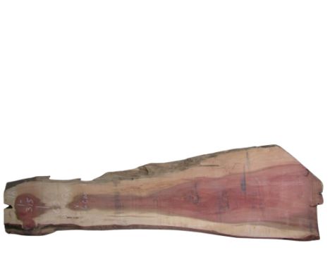 A large plank of cedar?  315 cm x 60 cm x 6 cm 