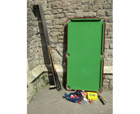 A collection of items to include a small snooker table and cue and balls, fender, etc