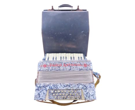 A Paolo Antonio Piano Accordion Made in Saxony with a blue pearlised body, original straps and case.