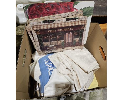 Box containing small collection of table linen&nbsp;including circular tablecloth and some napkins, place mats and coasters a