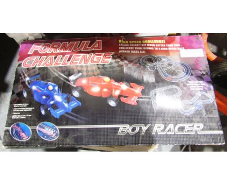 Quantity of toys and games to include Formula Challenge Boy Racer boxed set, Scalextric GP0 set (not in original box), Waddin