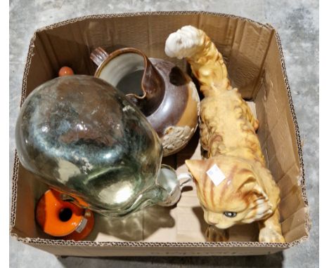 Goebel porcelain model of a cat, a Beswick pottery model of a cat, a Royal Doulton brown salt glazed stoneware harvest jug, a