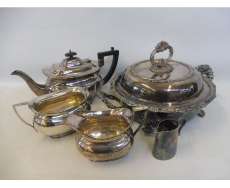 An Old Sheffield plated two handled lidded warming tureen, a three piece silver plated teaset etc.