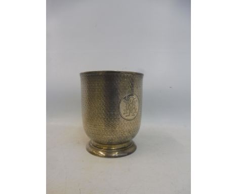 A Victorian silver christening mug with engine turned decoration and monogram, maker Charles Frederick Hancock, London 1870, 