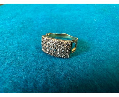 An unusual ring (presumed 9ct gold) set with 42 old brilliant cut diamonds, approx. 4.8g, size N/O. 