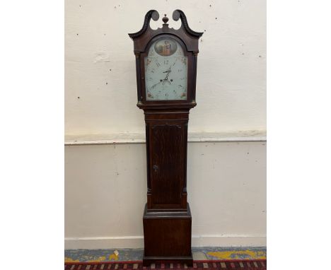 A 19th Century eight day longcase clock, with arched painted dial, swan neck pediment and reeded half pilasters, the dial nam