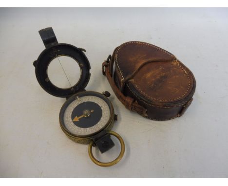 A WWI 1917 Verner's Pattern brass compass, in a leather case.