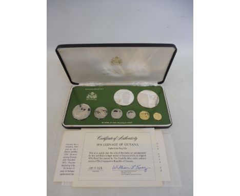 A cased 1976 Franklin Mint Coinage of Guyana Eight-Coin proof set, with certificate.