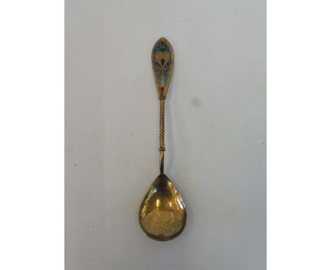 A Continental silver gilt spoon with an enamel handle, stamped .925 S.