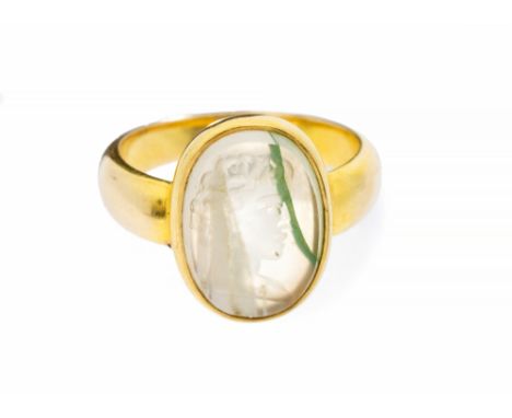 A 19th century agate intaglio ring, comprising an oval form carved with a classical Roman figure looking to the right, width 
