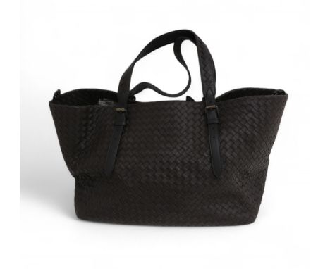 A Bottega Veneta fourre-tout leather handbag in dark brown/black with internal zip fastening pocket, suede lining and hand mi