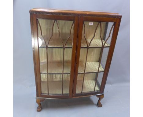 SOLD IN TIMED AUCTION A 20th century mahogany bow fronted display cabinet raised on ball and claw feet H 125 x W 88 x D 33cm 