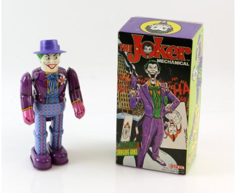 Batman - Mechanical Tin Plate Joker by Billiken - swing arms, new crank mechanical key, wind-up motor walking, from 1989, box