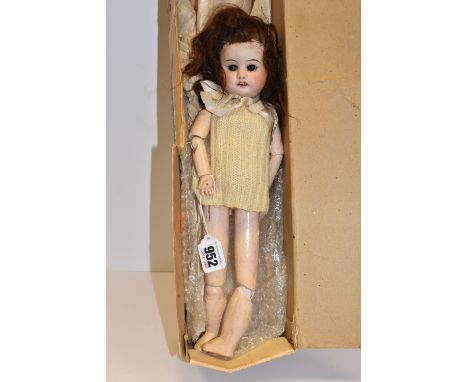 AN S.F.B.J. BISQUE HEAD DOLL, nape of neck marked 'S.F.B.J. 60 Paris -4/0-, sleeping blue glass eyes with damage to lids and 