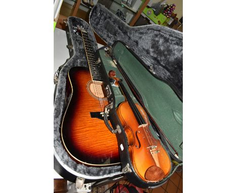 A BRUNSWICK RODEO SERIES ACOUSTIC GUITAR,  model number BMT105-CB, made in China, serial number 86020056 with a fitted hard c