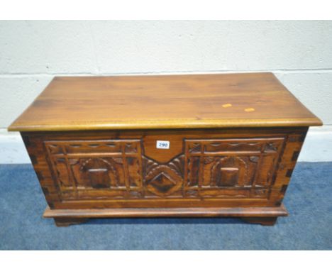 A SMALL HARDWOOD STORAGE CHEST, the hinged lid enclosing a smaller storage section, width 75cm x depth 34cm x height 42cm, co