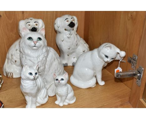 A COLLECTION OF BESWICK CATS AND DOGS all in white colourways comprising 'Cat Seated Scratching Ear' No. 1877, 'Persian Cat S