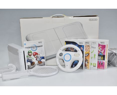 NINTENDO WII VIDEO GAME CONSOLE AND GAMES, includes Mario Kart Wii, Wii Fit Plus (with a balance board boxed included), Wii S